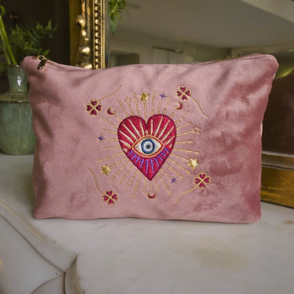 Front view of the Edoaria Rouge Amour Grand Toiletry Bag in soft pink velvet, embroidered with celestial hearts, stars, and moons in dusky pink, gold, and purple.