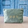 Petite makeup bags with Grand Duo monogram in aqua, personalized pouch