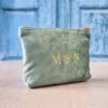 Petite makeup bags with Grand Duo monogram in aqua, personalized pouch