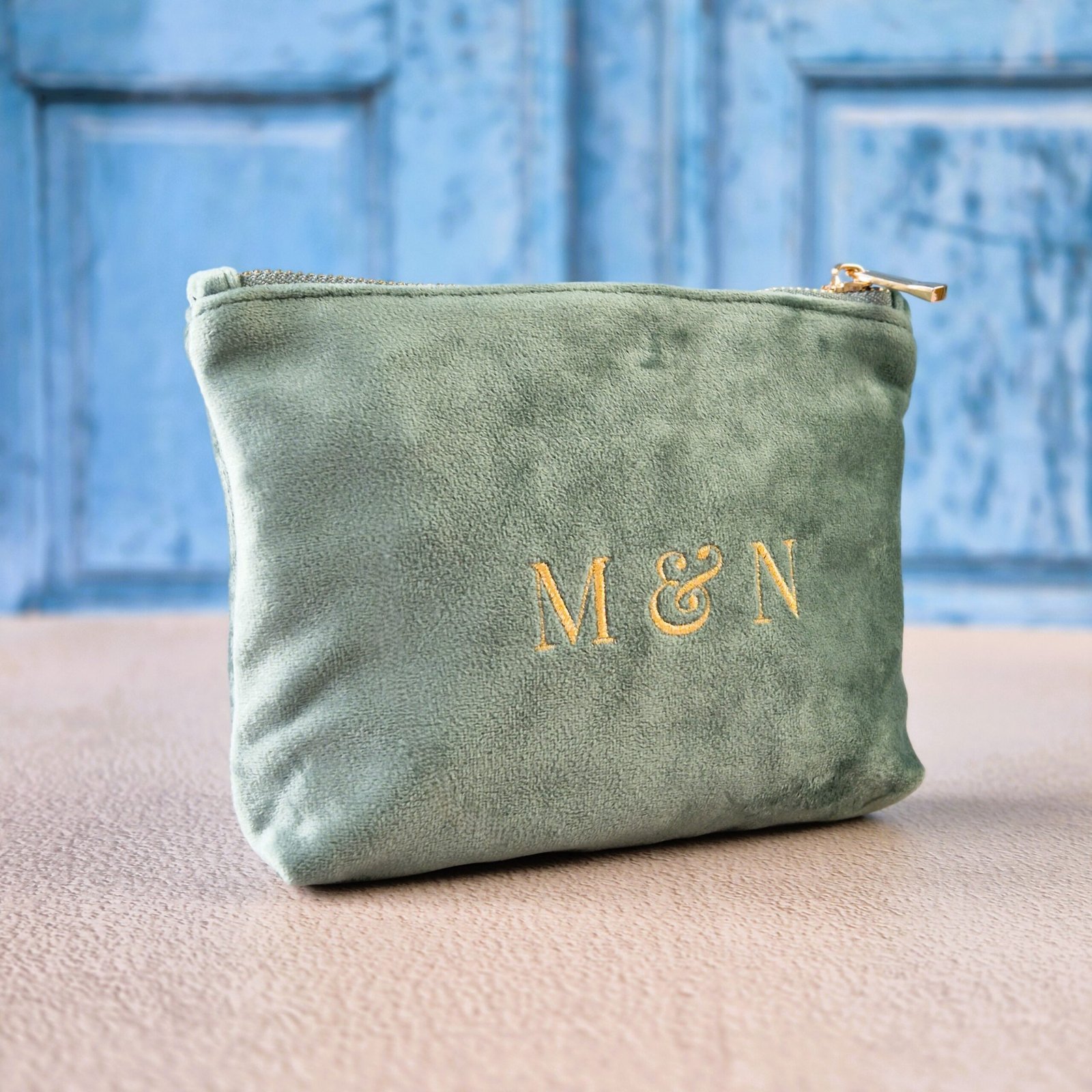 Petite makeup bags with Grand Duo monogram in aqua, personalized pouch
