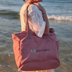Alexandra, our owner, wearing the Edoaria Everyday tote bag from the Rouge Amour collection with embroidered logo